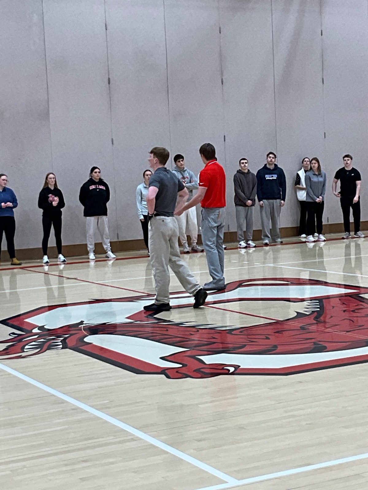 Carter demonstrating a physical education activity in the gym